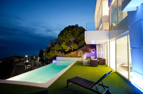 Infinity pool at dusk in Villa Casablanca