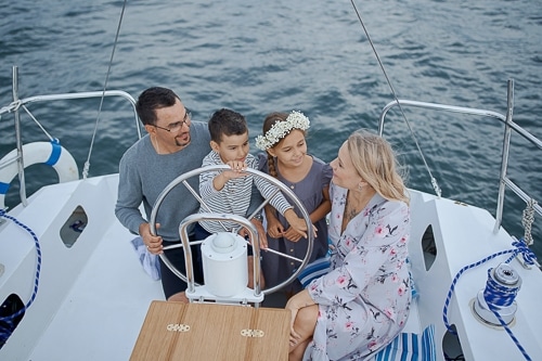 A family on a boat in Sitges
