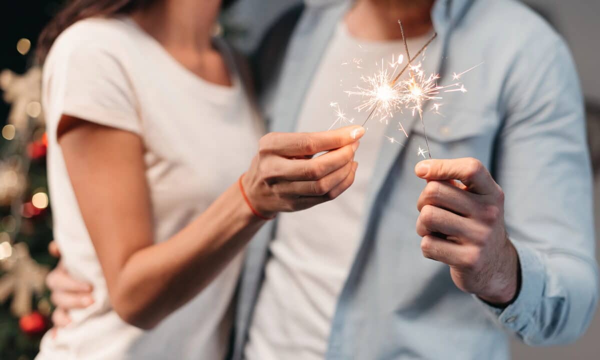 A couple with sparklers on New Years Eve in Barcelona